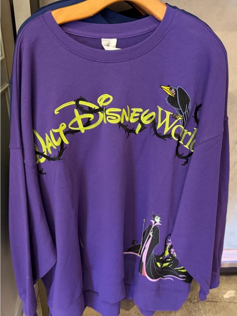 M Disney Parks 2026 WDW Villains Maleficent Sweatshirt Purple Pullover